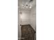 Walk-in closet with adjustable shelving and carpeted floors at 5311 W Fulton St, Phoenix, AZ 85043