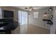 Open floor plan with dark cabinetry, tiled floor, an island, and bright light, perfect for hosting friends and Gathering at 5311 W Fulton St, Phoenix, AZ 85043