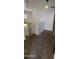 Carpeted landing area with bright natural light and a white railing at 5311 W Fulton St, Phoenix, AZ 85043