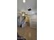 Spacious living room features neutral paint and tile flooring with access to the staircase at 5311 W Fulton St, Phoenix, AZ 85043
