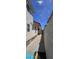 Narrow side yard between houses with brick ground, great for passage at 5311 W Fulton St, Phoenix, AZ 85043