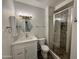 Updated bathroom with modern vanity, tiled shower and new fixtures at 555 N May -- # 1, Mesa, AZ 85201