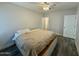 Bedroom with hardwood-style floors, new fan, and a light wall color at 555 N May -- # 1, Mesa, AZ 85201