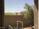 A peaceful backyard view features desert landscaping and a block wall, enhancing privacy and outdoor enjoyment at 6506 S 50Th Ln, Laveen, AZ 85339
