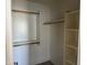Bright closet space with shelving for storage and organization at 6506 S 50Th Ln, Laveen, AZ 85339
