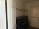 Open closet showing a dresser with multiple drawers for ample storage at 6506 S 50Th Ln, Laveen, AZ 85339