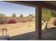 Enjoy outdoor living on this covered patio with a built-in grill, perfect for entertaining guests at 6506 S 50Th Ln, Laveen, AZ 85339
