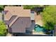 An aerial view of the home with its tile roof, swimming pool, patio and landscaping at 7336 E Overlook Dr, Scottsdale, AZ 85255