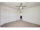 Comfortable bedroom featuring a ceiling fan, and convenient closet space for storage at 7336 E Overlook Dr, Scottsdale, AZ 85255