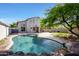 Large, private pool and patio area, perfect for entertaining and relaxation with lush landscape at 7336 E Overlook Dr, Scottsdale, AZ 85255