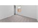 Compact bedroom with closet and window, featuring neutral color scheme at 7643 W Park St, Laveen, AZ 85339