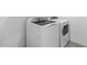 Laundry area equipped with a modern washing machine and dryer, ready for efficient laundry care at 7643 W Park St, Laveen, AZ 85339