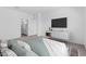 Comfortable bedroom featuring a large bed, media center and ample space at 7643 W Park St, Laveen, AZ 85339