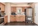 Practical kitchen with updated appliances, ample cabinet space, and durable countertops for easy meal preparation at 801 E Oakland St, Chandler, AZ 85225