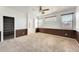 Spacious bedroom with carpet, a walk-in closet, and neutral tones at 809 S 120Th Ave, Avondale, AZ 85323