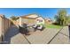 Inviting backyard patio featuring a fire pit and outdoor seating at 809 S 120Th Ave, Avondale, AZ 85323