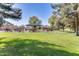 Community playground featuring shaded play structures, grassy fields, and a picnic pavilion, perfect for outdoor fun at 809 S 120Th Ave, Avondale, AZ 85323