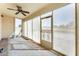 Enclosed sun room with ceiling fan and plenty of natural light at 809 S 120Th Ave, Avondale, AZ 85323
