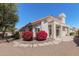 Charming home featuring a red tile roof, desert landscaping, and a welcoming entrance at 9204 N 106Th Way, Scottsdale, AZ 85258