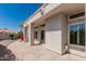Exterior view featuring a covered patio and textured facade at 9204 N 106Th Way, Scottsdale, AZ 85258