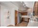 Spacious kitchen boasting stainless steel appliances, granite counters, and custom cabinets at 9204 N 106Th Way, Scottsdale, AZ 85258