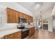 Bright kitchen showcasing modern appliances, light countertops, and a stylish tile floor at 9204 N 106Th Way, Scottsdale, AZ 85258