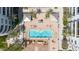 Stunning aerial view shows the community pool area, surrounded by luxurious amenities and green spaces at 945 E Playa Del Norte Dr # 1003, Tempe, AZ 85288