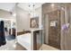Stylish bathroom featuring a glass-enclosed shower and a soaking tub at 945 E Playa Del Norte Dr # 1003, Tempe, AZ 85288