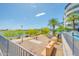 A common area along the lake has a walking path and a manicured gravel landscape at 945 E Playa Del Norte Dr # 1003, Tempe, AZ 85288