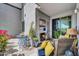 Inviting patio area boasts comfortable seating, a stylish fireplace, and lovely garden views at 945 E Playa Del Norte Dr # 1003, Tempe, AZ 85288