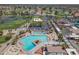 Beautiful aerial view of a community pool with a diving well and lap pool at 9847 E Michigan Ave, Sun Lakes, AZ 85248