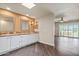 Bright bathroom with double sinks, granite countertops, and views to the balcony at 9847 E Michigan Ave, Sun Lakes, AZ 85248