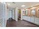 Spacious bathroom with a double vanity, granite countertop, and walk-in shower at 9847 E Michigan Ave, Sun Lakes, AZ 85248