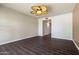 Spacious bedroom features ceramic tile flooring and a stylish ceiling fan with light at 9847 E Michigan Ave, Sun Lakes, AZ 85248