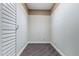 Walk in closet with dark floor and white walls at 9847 E Michigan Ave, Sun Lakes, AZ 85248
