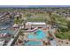 Bird's-eye view featuring a community center, pool, tennis courts, and manicured green spaces at 9847 E Michigan Ave, Sun Lakes, AZ 85248