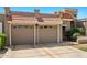Charming home with a two-car garage, tile roof, and well-maintained landscaping at 9847 E Michigan Ave, Sun Lakes, AZ 85248