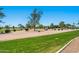 Well-manicured golf course with mature shade trees at 9847 E Michigan Ave, Sun Lakes, AZ 85248