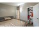 Simple bedroom with neutral walls, carpet, and a closet at 10951 N 91St Ave # 32, Peoria, AZ 85345