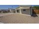 Charming home with a carport, low-maintenance landscaping and neutral tones at 10951 N 91St Ave # 32, Peoria, AZ 85345