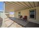 Spacious covered patio features outdoor seating, perfect for enjoying the views of the surrounding landscape at 10951 N 91St Ave # 32, Peoria, AZ 85345