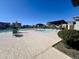 A community pool that features shaded seating areas and tanning at 10983 W Mckinley St, Avondale, AZ 85323