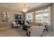 Comfortable living room featuring a media center and elegant furniture at 132 E El Prado Dr, Queen Creek, AZ 85140