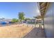 Spacious backyard with gravel, a patio, and a gazebo near the house at 1529 W Wickieup Ln, Phoenix, AZ 85027