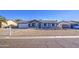 Well-maintained single-story home with gravel landscaping and a cozy, inviting entrance at 1529 W Wickieup Ln, Phoenix, AZ 85027