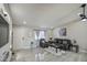 Bright living room featuring hard surface floors and a comfortable furniture set at 1529 W Wickieup Ln, Phoenix, AZ 85027