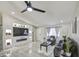 Modern living room with fireplace and a large television perfect for entertaining at 1529 W Wickieup Ln, Phoenix, AZ 85027