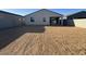 Backyard with fresh layer of topsoil and block fence that surrounds the property at 15773 W Beryl Ave, Waddell, AZ 85355