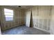 Bedroom with neutral walls and natural light from the window at 15773 W Beryl Ave, Waddell, AZ 85355
