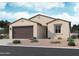Charming single-story home featuring a two-car garage, low maintenance landscaping, and inviting curb appeal at 15773 W Beryl Ave, Waddell, AZ 85355